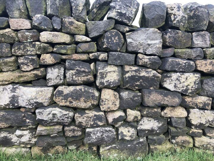 Dry stone walls are 'dry' because they are made without mortar, simply relying on their complex structure to stay up.